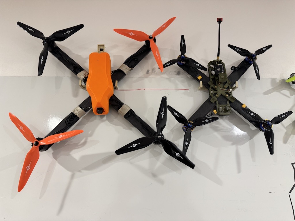 Two Orbital FPV-class composite drone airframes